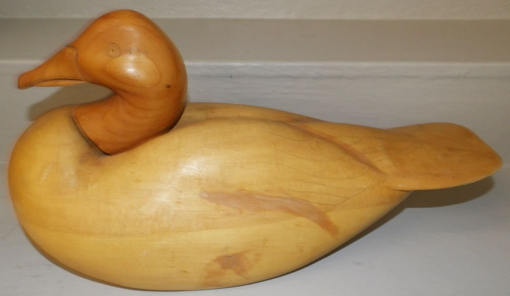 Carved Wood Duck Decoy Signed & Dated 1990: Carved Wood Duck Decoy Signed & Dated 1990. 9 3/4" H 18" L ALL DESCRIPTIONS AND ANY CONDITION STATEMENT GIVEN BY LANGSTON AUCTION GALLERY ARE STRICTLY OPINIONS AND LANGSTON'S SHALL HAVE NO RESPONSIBIL