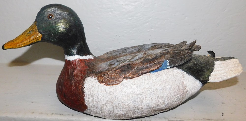 Painted Resin Duck Decoy: Painted Resin Duck Decoy . 7" H 16 1/2" L ALL DESCRIPTIONS AND ANY CONDITION STATEMENT GIVEN BY LANGSTON AUCTION GALLERY ARE STRICTLY OPINIONS AND LANGSTON'S SHALL HAVE NO RESPONSIBILITY FOR ERRORS OR