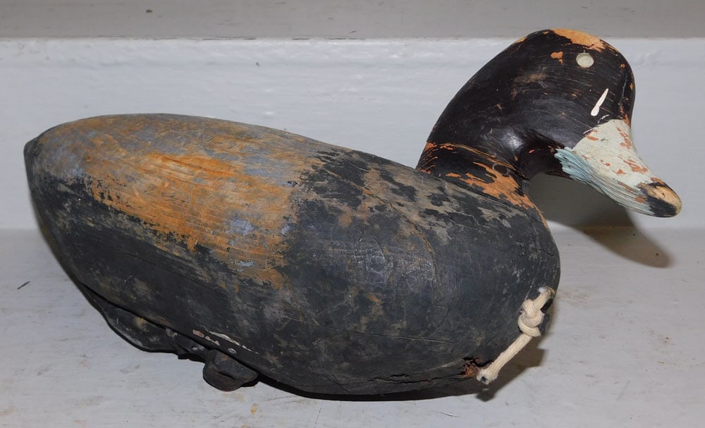 Antique Painted Carved Wood Duck Decoy with Lead Weight: Antique Painted Carved Wood Duck Decoy with Lead Weight . 9" H 17 1/2" L ALL DESCRIPTIONS AND ANY CONDITION STATEMENT GIVEN BY LANGSTON AUCTION GALLERY ARE STRICTLY OPINIONS AND LANGSTON'S SHALL HAVE 