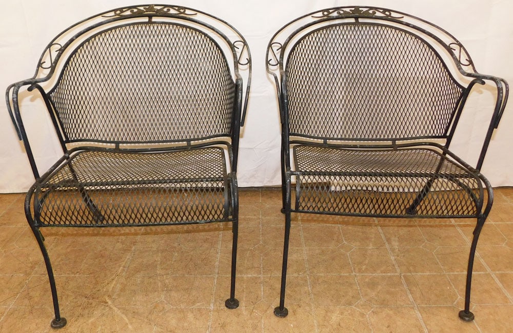 Pair of Painted Wrought Iron Arm Chairs: Pair of Painted Wrought Iron Arm Chairs . 31 1/4" H 26" W 29" D ALL DESCRIPTIONS AND ANY CONDITION STATEMENT GIVEN BY LANGSTON AUCTION GALLERY ARE STRICTLY OPINIONS AND LANGSTON'S SHALL HAVE NO RESPON