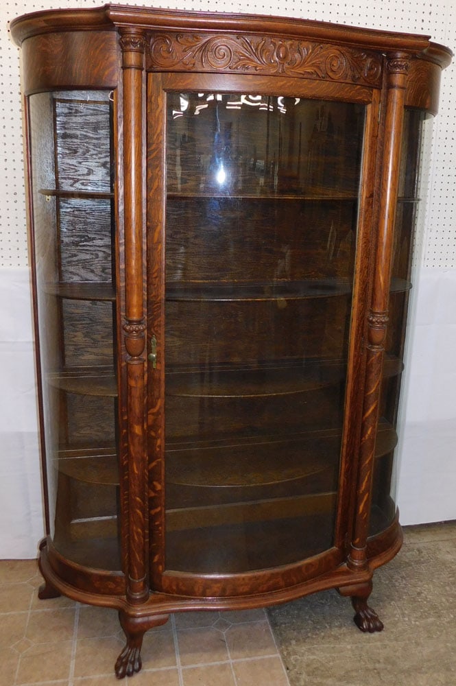 Antique Carved Quartersawn Oak China Cabinet with Paw Feet: Antique Carved Quartersawn Oak China Cabinet with Paw Feet. 69 1/2" H 50 1/2" W 18" D ALL DESCRIPTIONS AND ANY CONDITION STATEMENT GIVEN BY LANGSTON AUCTION GALLERY ARE STRICTLY OPINIONS AND