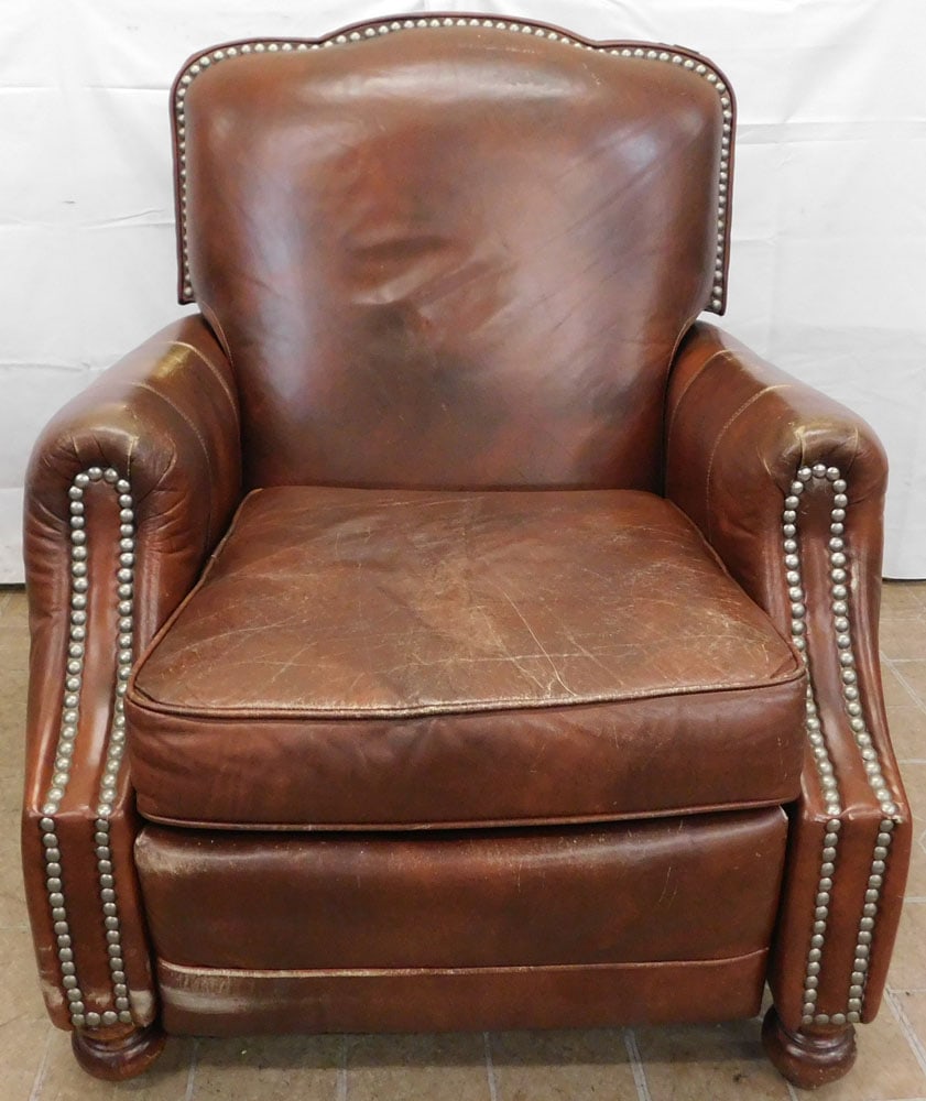 Leather Recliner by Barcalounger: Leather Recliner by Barcalounger. 39 3/4" H 33 1/2" W 38" D ALL DESCRIPTIONS AND ANY CONDITION STATEMENT GIVEN BY LANGSTON AUCTION GALLERY ARE STRICTLY OPINIONS AND LANGSTON'S SHALL HAVE NO