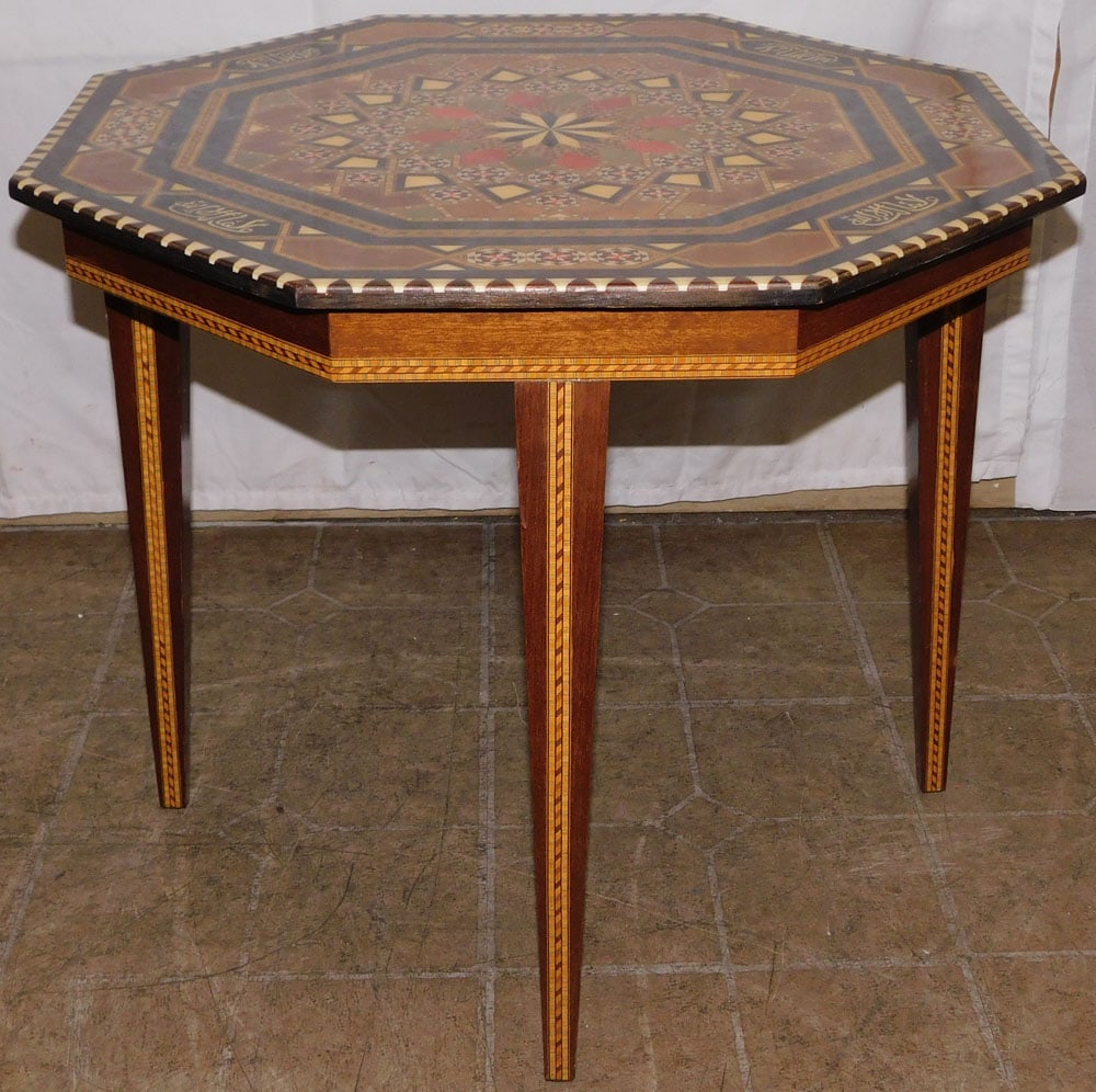 Octagonal Form Anglo Indian Inlaid Tea Table: Octagonal Form Anglo Indian Inlaid Tea Table . 19 1/4" H 25" Dia. ALL DESCRIPTIONS AND ANY CONDITION STATEMENT GIVEN BY LANGSTON AUCTION GALLERY ARE STRICTLY OPINIONS AND LANGSTON'S SHALL HAVE NO