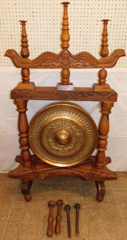 Carved Mahogany & Brass Oriental Gong: Carved Mahogany & Brass Oriental Gong . 59 1/2" H 36" W 13" D ALL DESCRIPTIONS AND ANY CONDITION STATEMENT GIVEN BY LANGSTON AUCTION GALLERY ARE STRICTLY OPINIONS AND LANGSTON'S SHALL HAVE NO RESPONSI