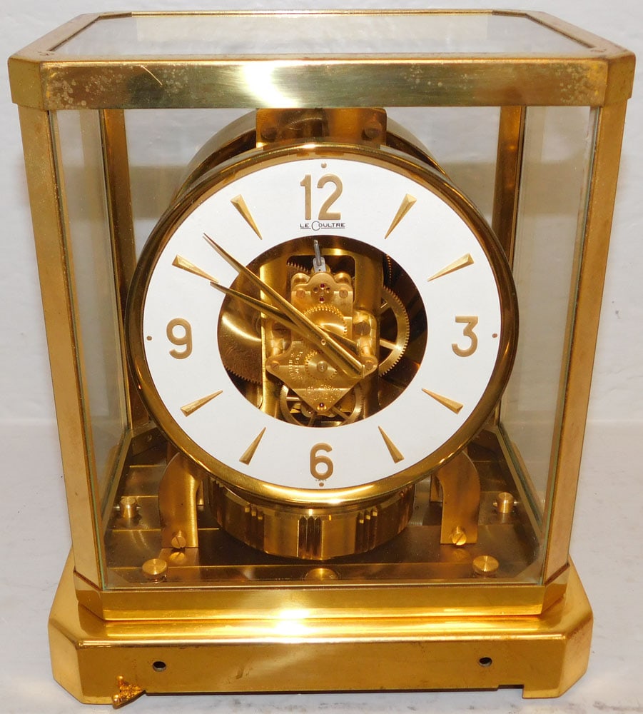 Le Coultre Swiss Atmos Clock: Le Coultre Swiss Atmos Clock . 9 1/4" H 8 1/4" W 6 1/4" D ALL DESCRIPTIONS AND ANY CONDITION STATEMENT GIVEN BY LANGSTON AUCTION GALLERY ARE STRICTLY OPINIONS AND LANGSTON'S SHALL HAVE NO RESPONSIBILI
