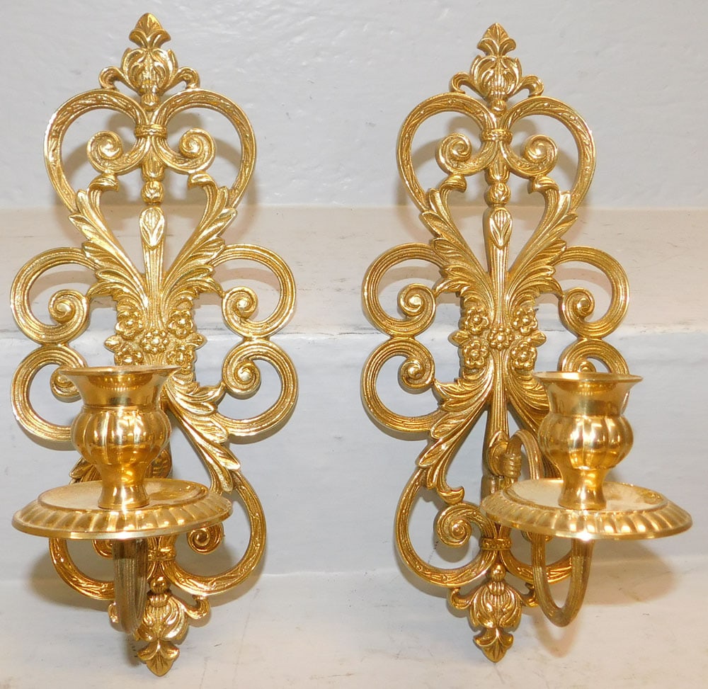 Pair of Brass Sconces: Pair of Brass Sconces . 13" H 5 1/2" W ALL DESCRIPTIONS AND ANY CONDITION STATEMENT GIVEN BY LANGSTON AUCTION GALLERY ARE STRICTLY OPINIONS AND LANGSTON'S SHALL HAVE NO RESPONSIBILITY FOR ERRORS OR