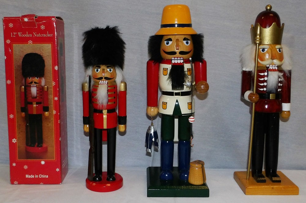 Lot of Painted Wood Nut Crackers: Lot of Painted Wood Nut Crackers . Up to 14" H 4 1/2" W "ALL DESCRIPTIONS AND ANY CONDITION STATEMENT GIVEN BY LANGSTON AUCTION GALLERY ARE STRICTLY OPINIONS AND LANGSTON'S SHALL HAVE NO RESPONSIBILIT