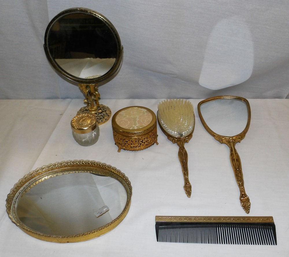 Lot of Gilded Metal Dresser Items: Lot of Gilded Metal Dresser Items . Up to 8 1/2" H 6 1/4" W "ALL DESCRIPTIONS AND ANY CONDITION STATEMENT GIVEN BY LANGSTON AUCTION GALLERY ARE STRICTLY OPINIONS AND LANGSTON'S SHALL HAVE NO RESPONSIB