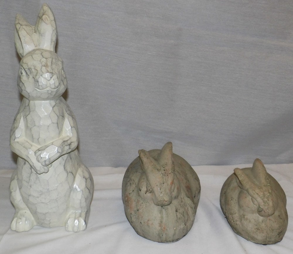 Lot of Ceramic & Resin Bunny Form Figures: Lot of Ceramic & Resin Bunny Form Figures . Up to 14" H 5" W "ALL DESCRIPTIONS AND ANY CONDITION STATEMENT GIVEN BY LANGSTON AUCTION GALLERY ARE STRICTLY OPINIONS AND LANGSTON'S SHALL HAVE NO RESPONSI