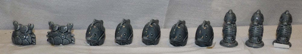 Lot of Pottery Salt & Pepper Shakers: Lot of Pottery Salt & Pepper Shakers . Up to 2 1/2" H 1 1/4" W "ALL DESCRIPTIONS AND ANY CONDITION STATEMENT GIVEN BY LANGSTON AUCTION GALLERY ARE STRICTLY OPINIONS AND LANGSTON'S SHALL HAVE NO RESPON