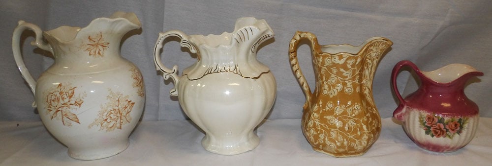 Lot of Porcelain Pitchers: Lot of Porcelain Pitchers . Up to 11 1/2" W 10" W "ALL DESCRIPTIONS AND ANY CONDITION STATEMENT GIVEN BY LANGSTON AUCTION GALLERY ARE STRICTLY OPINIONS AND LANGSTON'S SHALL HAVE NO RESPONSIBILITY FOR 