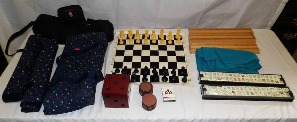 Lot of Travel Games & Mahjong Set in Travel Bag: Lot of Travel Games & Mahjong Set in Travel Bag. Bag: 11" H 21" W "ALL DESCRIPTIONS AND ANY CONDITION STATEMENT GIVEN BY LANGSTON AUCTION GALLERY ARE STRICTLY OPINIONS AND LANGSTON'S SHALL HAVE NO RES