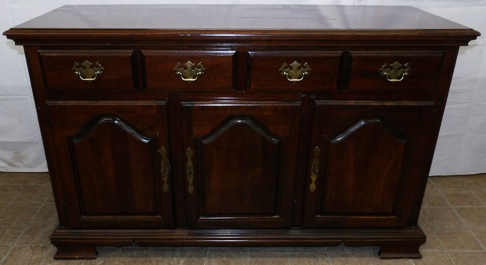 Cherry Sideboard by Kincaid: Cherry Sideboard by Kincaid . 33 1/2" H 54 1/4" W 19 1/4" D "ALL DESCRIPTIONS AND ANY CONDITION STATEMENT GIVEN BY LANGSTON AUCTION GALLERY ARE STRICTLY OPINIONS AND LANGSTON'S SHALL HAVE NO RESPONSIB