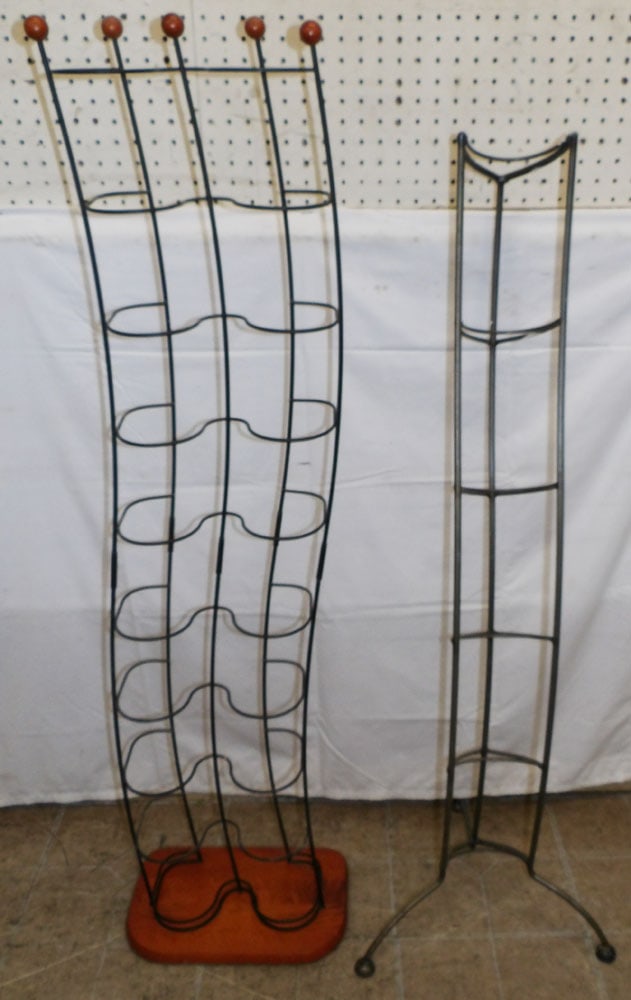 Two Metal Stands: Two Metal Stands . Up to 51 1/2" H 12 1/2" W "ALL DESCRIPTIONS AND ANY CONDITION STATEMENT GIVEN BY LANGSTON AUCTION GALLERY ARE STRICTLY OPINIONS AND LANGSTON'S SHALL HAVE NO RESPONSIBILITY FOR