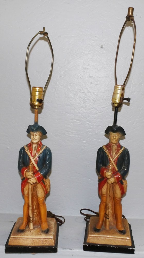 Pair of Painted Ceramic Soldier Lamps: Pair of Painted Ceramic Soldier Lamps. 28" H 6" Dia. "ALL DESCRIPTIONS AND ANY CONDITION STATEMENT GIVEN BY LANGSTON AUCTION GALLERY ARE STRICTLY OPINIONS AND LANGSTON'S SHALL HAVE NO RESPONSIBILITY