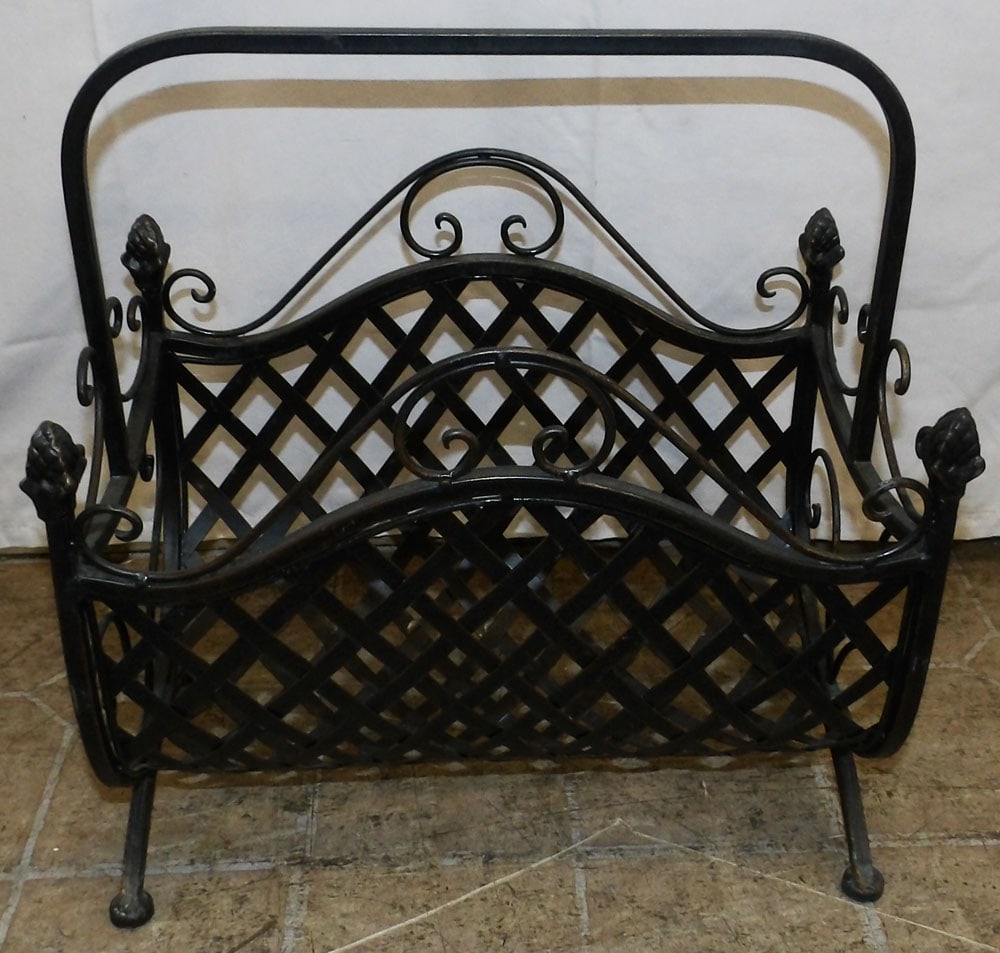 Metal Magazine Stand: Metal Magazine Stand . 17" H 15 1/2" W 10" D "ALL DESCRIPTIONS AND ANY CONDITION STATEMENT GIVEN BY LANGSTON AUCTION GALLERY ARE STRICTLY OPINIONS AND LANGSTON'S SHALL HAVE NO RESPONSIBILITY FOR