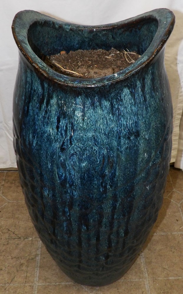 Painted Pottery Fish Form Floor Jardiniere: Painted Pottery Fish Form Floor Jardiniere . 28 1/4" H 12 1/4" Dia. "ALL DESCRIPTIONS AND ANY CONDITION STATEMENT GIVEN BY LANGSTON AUCTION GALLERY ARE STRICTLY OPINIONS AND LANGSTON'S SHALL HAVE NO