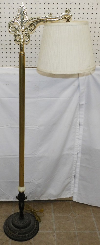 Brass & Cast Iron Base Floor Lamp: Brass & Cast Iron Base Floor Lamp . 57 1/2" H 16" W "ALL DESCRIPTIONS AND ANY CONDITION STATEMENT GIVEN BY LANGSTON AUCTION GALLERY ARE STRICTLY OPINIONS AND LANGSTON'S SHALL HAVE NO RESPONSIBILITY