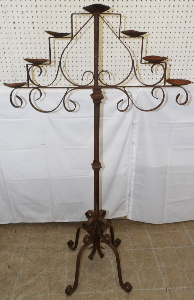 Wrought Iron Candleholder: Wrought Iron Candleholder . 58 1/4" H 32 1/2" W "ALL DESCRIPTIONS AND ANY CONDITION STATEMENT GIVEN BY LANGSTON AUCTION GALLERY ARE STRICTLY OPINIONS AND LANGSTON'S SHALL HAVE NO RESPONSIBILITY FOR