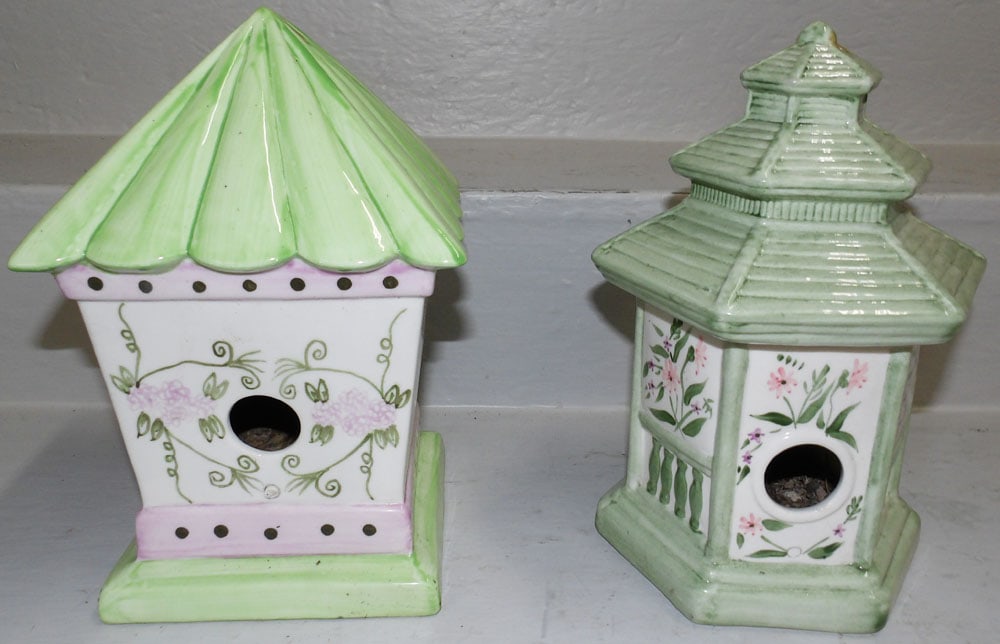 Two Painted Porcelain Bird Houses: Two Painted Porcelain Bird Houses . Up to 10" H 7" Dia. "ALL DESCRIPTIONS AND ANY CONDITION STATEMENT GIVEN BY LANGSTON AUCTION GALLERY ARE STRICTLY OPINIONS AND LANGSTON'S SHALL HAVE NO