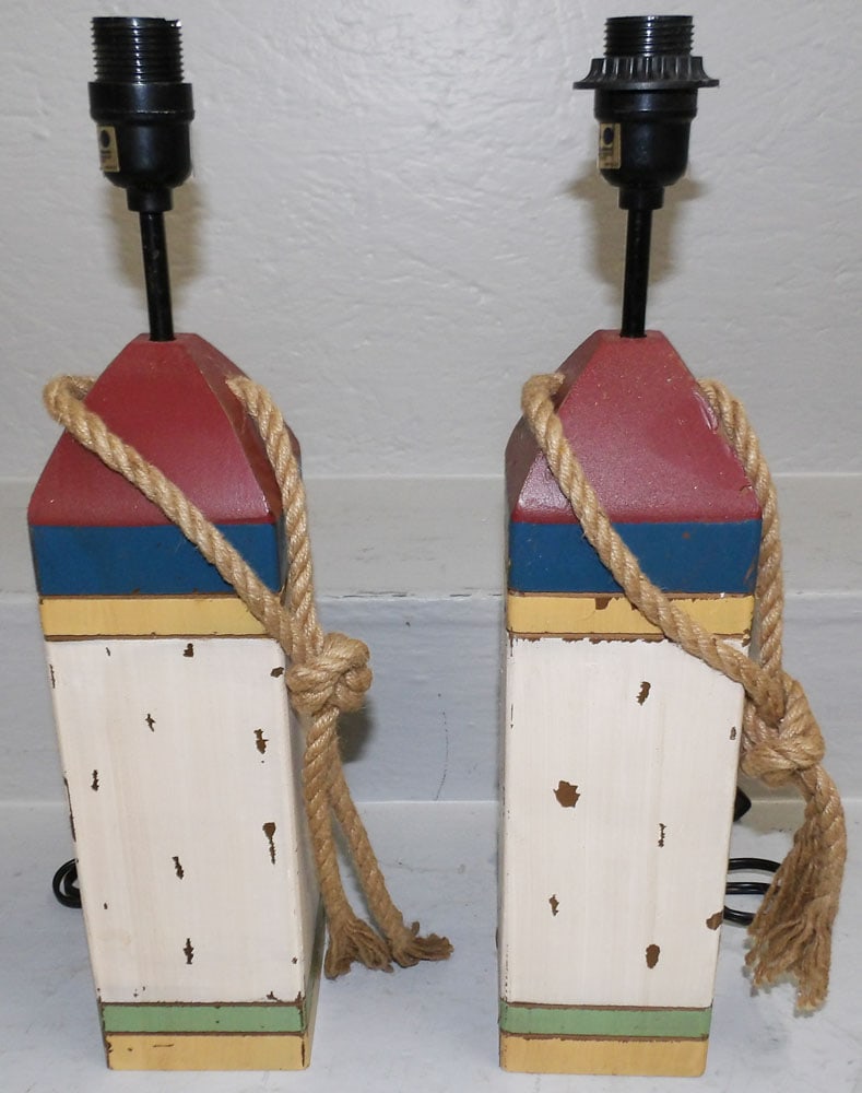 Two Painted Wood Buoy Lamps: Two Painted Wood Buoy Lamps. 18" H 4" Dia. "ALL DESCRIPTIONS AND ANY CONDITION STATEMENT GIVEN BY LANGSTON AUCTION GALLERY ARE STRICTLY OPINIONS AND LANGSTON'S SHALL HAVE NO RESPONSIBILITY FOR ERRORS