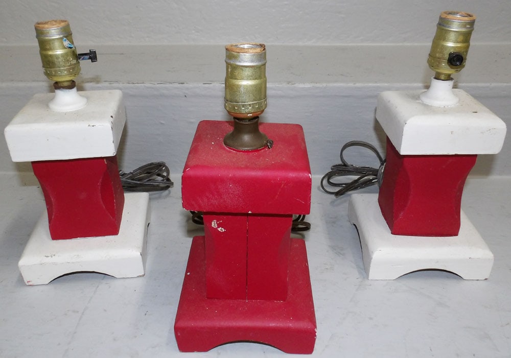 Three Painted Wood Lamps: Three Painted Wood Lamps. 11" H 4 3/4" Dia. "ALL DESCRIPTIONS AND ANY CONDITION STATEMENT GIVEN BY LANGSTON AUCTION GALLERY ARE STRICTLY OPINIONS AND LANGSTON'S SHALL HAVE NO RESPONSIBILITY FOR