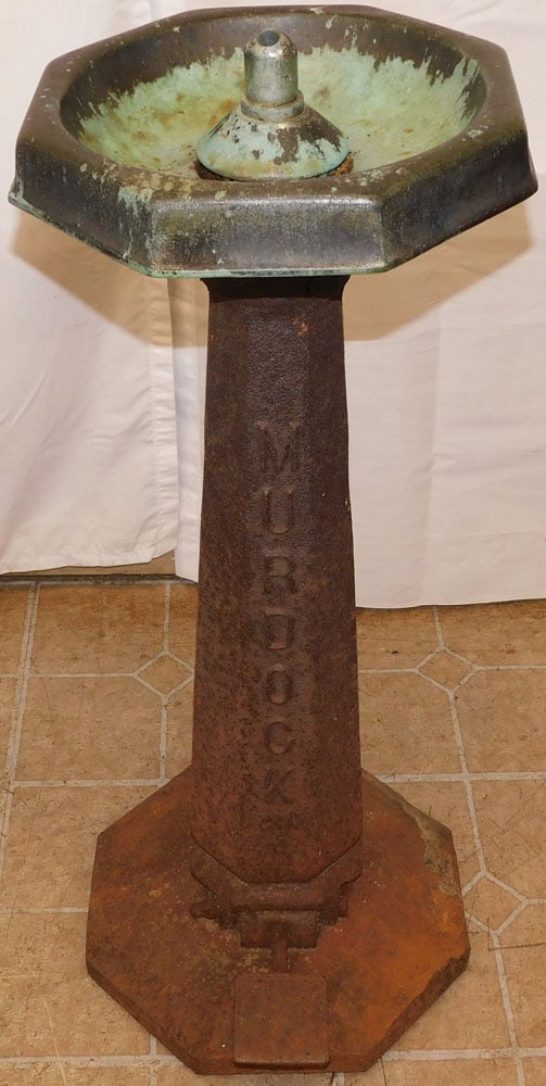 Cast Iron Water Fountain by Murdock: Cast Iron Water Fountain by Murdock. 32" H 15" Dia. "ALL DESCRIPTIONS AND ANY CONDITION STATEMENT GIVEN BY LANGSTON AUCTION GALLERY ARE STRICTLY OPINIONS AND LANGSTON'S SHALL HAVE NO RESPONSIBILITY