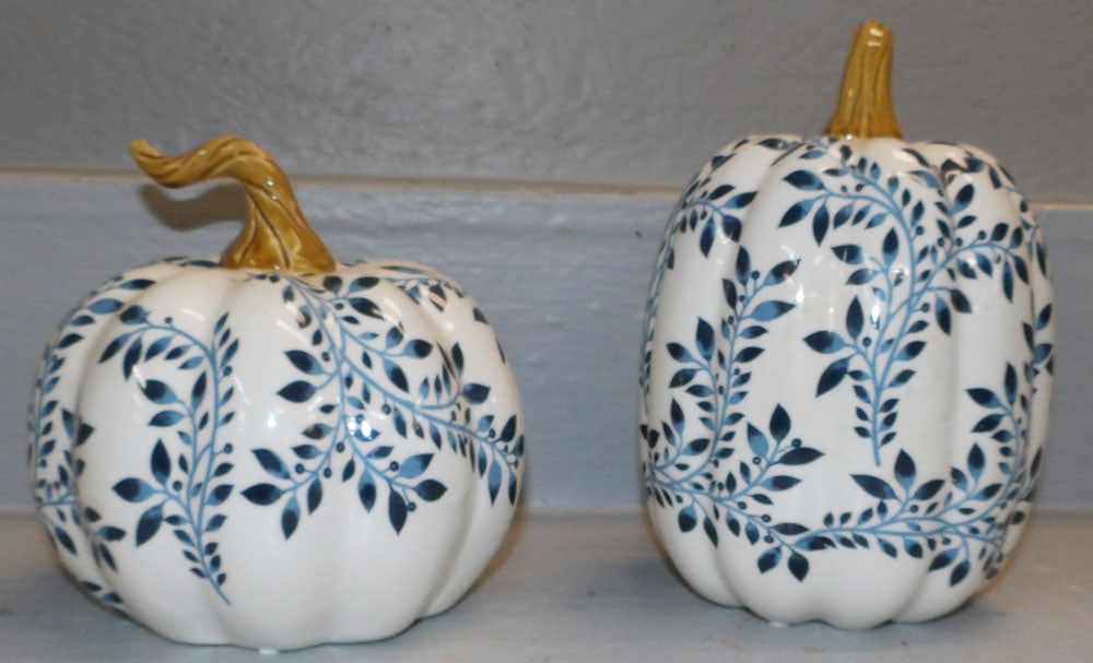 Two Blue & White Porcelain Pumpkins: Two Blue & White Porcelain Pumpkins . 8 1/2" H 6" Dia. "ALL DESCRIPTIONS AND ANY CONDITION STATEMENT GIVEN BY LANGSTON AUCTION GALLERY ARE STRICTLY OPINIONS AND LANGSTON'S SHALL HAVE NO