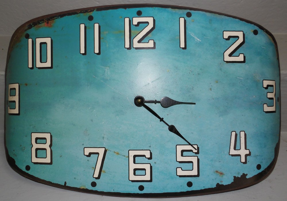 Decorative Painted Metal Wall Clock: Decorative Painted Metal Wall Clock . 21" x 12 3/4" "ALL DESCRIPTIONS AND ANY CONDITION STATEMENT GIVEN BY LANGSTON AUCTION GALLERY ARE STRICTLY OPINIONS AND LANGSTON'S SHALL HAVE NO RESPONSIBILITY