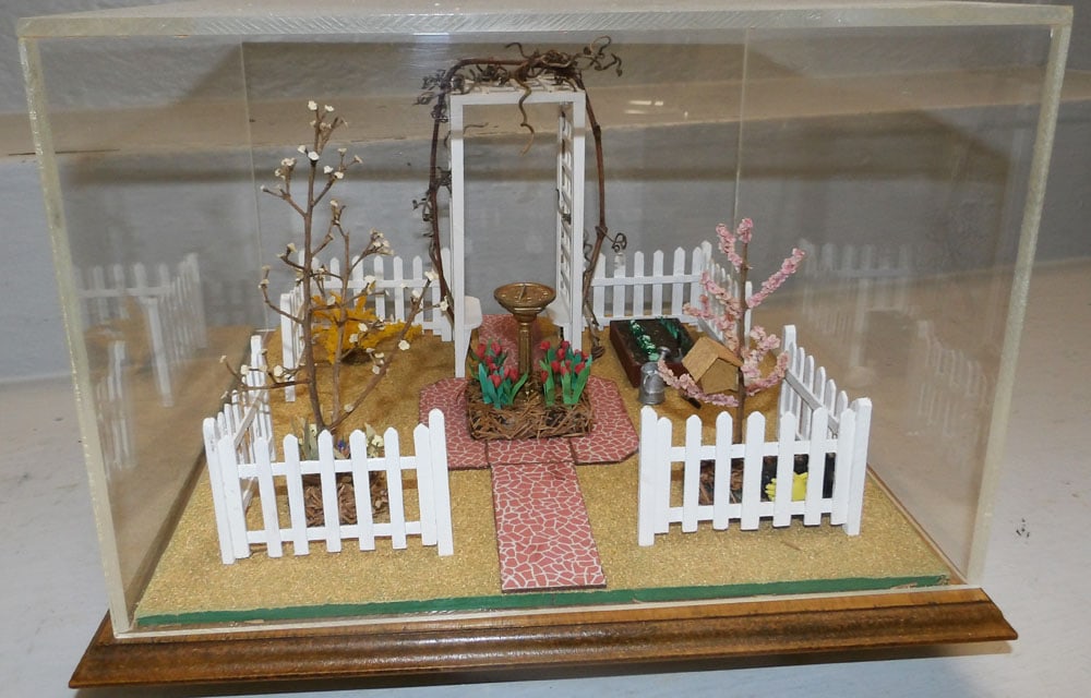 Revolving Acrylic Case Diorama on Pine Base: Revolving Acrylic Case Diorama on Pine Base. 10" H 13" W 13 1/4" D "ALL DESCRIPTIONS AND ANY CONDITION STATEMENT GIVEN BY LANGSTON AUCTION GALLERY ARE STRICTLY OPINIONS AND LANGSTON'S SHALL HAVE NO