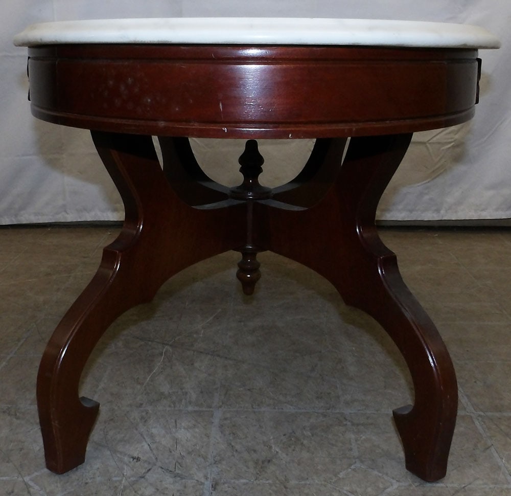 Mahogany Victorian Style Oval Marble Top Coffee Table: Mahogany Victorian Style Oval Marble Top Coffee Table . 17 1/2" H 32 1/2" W 21 3/4" D "ALL DESCRIPTIONS AND ANY CONDITION STATEMENT GIVEN BY LANGSTON AUCTION GALLERY ARE STRICTLY OPINIONS AND