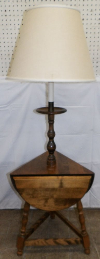 Maple Floor Lamp: Maple Floor Lamp. 55 1/2" H 18 1/4" Dia. "ALL DESCRIPTIONS AND ANY CONDITION STATEMENT GIVEN BY LANGSTON AUCTION GALLERY ARE STRICTLY OPINIONS AND LANGSTON'S SHALL HAVE NO RESPONSIBILITY FOR ERRORS