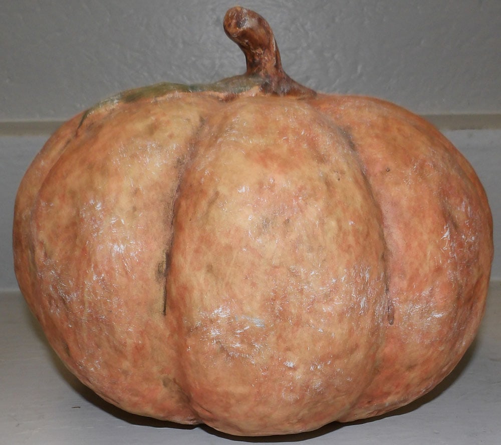 Painted Ceramic Pumpkin: Painted Ceramic Pumpkin. 9 1/2" H 11 1/2" Dia. "ALL DESCRIPTIONS AND ANY CONDITION STATEMENT GIVEN BY LANGSTON AUCTION GALLERY ARE STRICTLY OPINIONS AND LANGSTON'S SHALL HAVE NO RESPONSIBILITY FOR