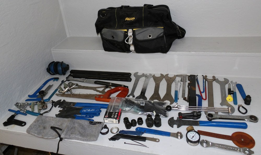 AWP Tool Bag with Tools: AWP Tool Bag with Tools . 20" W 10 1/2" D "ALL DESCRIPTIONS AND ANY CONDITION STATEMENT GIVEN BY LANGSTON AUCTION GALLERY ARE STRICTLY OPINIONS AND LANGSTON'S SHALL HAVE NO RESPONSIBILITY FOR ERRORS