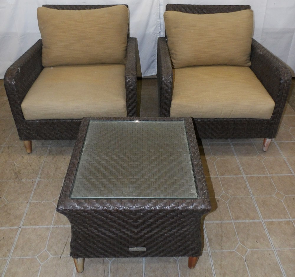 Two Faux Rattan Outdoor Chairs & Ottoman: Two Faux Rattan Outdoor Chairs & Ottoman . 30 1/2" H 29" W 30" D "ALL DESCRIPTIONS AND ANY CONDITION STATEMENT GIVEN BY LANGSTON AUCTION GALLERY ARE STRICTLY OPINIONS AND LANGSTON'S SHALL HAVE NO