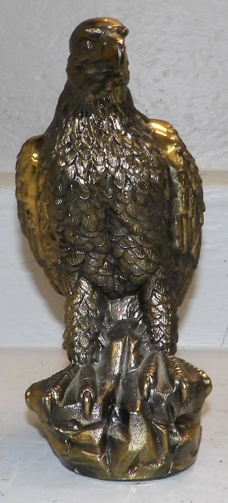 Gilded Metal Eagle Statue: Gilded Metal Eagle Statue. 10 1/2" H 7" W "ALL DESCRIPTIONS AND ANY CONDITION STATEMENT GIVEN BY LANGSTON AUCTION GALLERY ARE STRICTLY OPINIONS AND LANGSTON'S SHALL HAVE NO RESPONSIBILITY FOR ERRORS