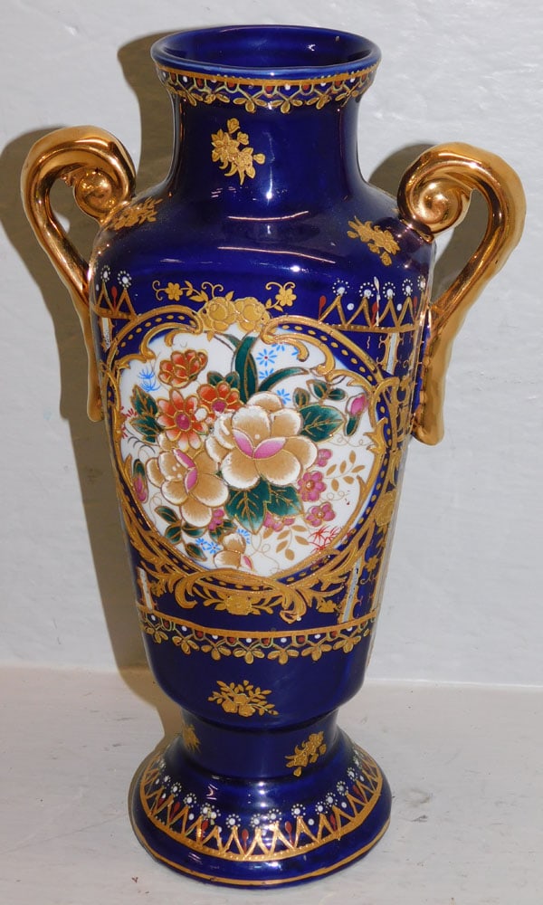 Cobalt Blue & Gold Oriental Porcelain Double Handle Vase: Cobalt Blue & Gold Oriental Porcelain Double Handle Vase. 12 1/2" H 7 1/4" W "ALL DESCRIPTIONS AND ANY CONDITION STATEMENT GIVEN BY LANGSTON AUCTION GALLERY ARE STRICTLY OPINIONS AND LANGSTON'S SHALL