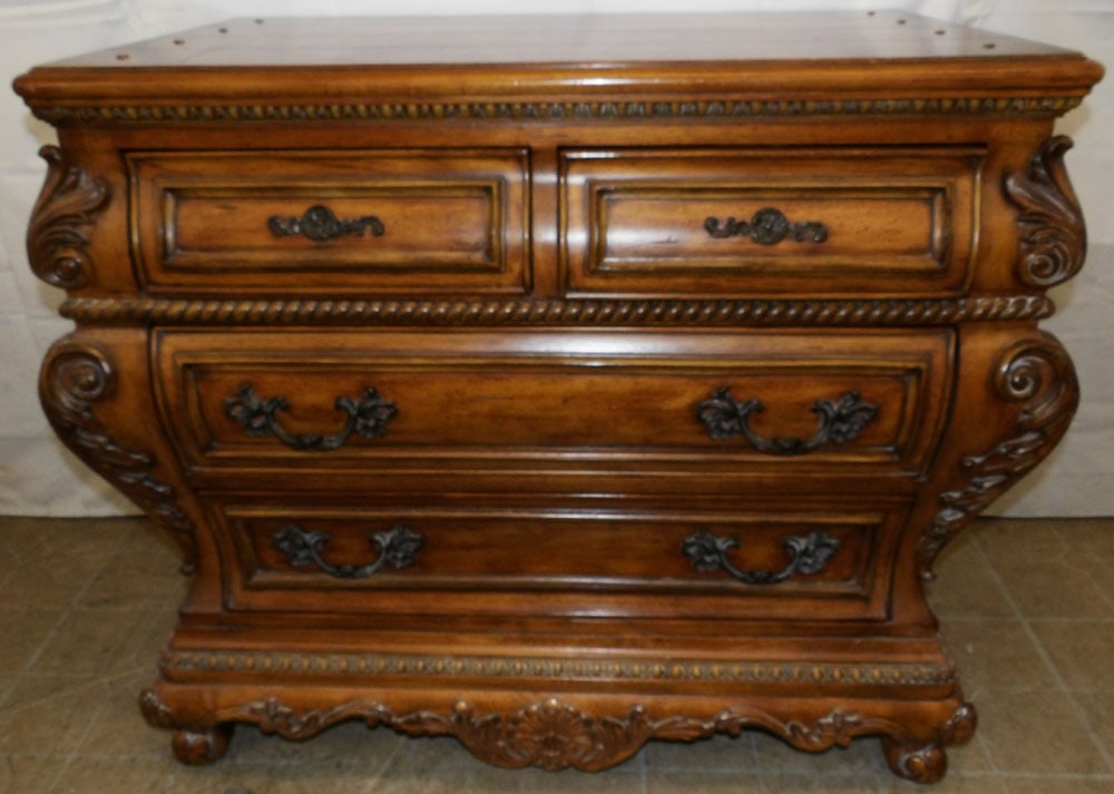 Ornate Carved Cherry Two Over Two Drawer Chest by Thomasville: Ornate Carved Cherry Two Over Two Drawer Chest by Thomasville . 34" H 40 1/2" W 24" D "ALL DESCRIPTIONS AND ANY CONDITION STATEMENT GIVEN BY LANGSTON AUCTION GALLERY ARE STRICTLY OPINIONS AND