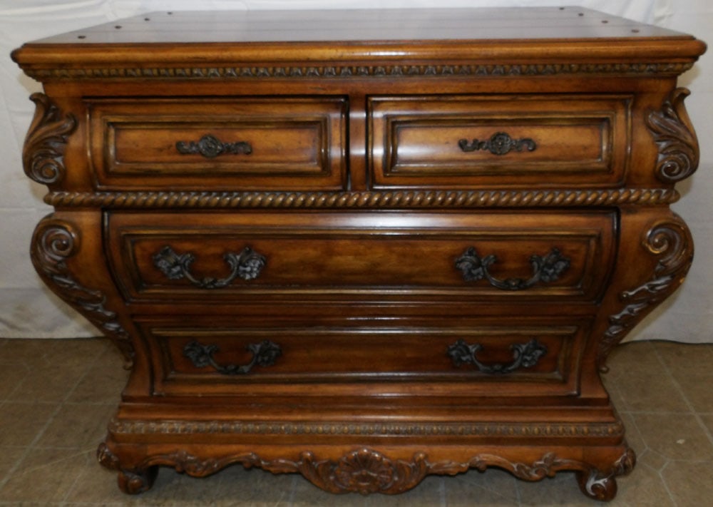 Ornate Carved Cherry Two Over Two Drawer Chest by Thomasville: Ornate Carved Cherry Two Over Two Drawer Chest by Thomasville . 34" H 40 1/2" W 24" D "ALL DESCRIPTIONS AND ANY CONDITION STATEMENT GIVEN BY LANGSTON AUCTION GALLERY ARE STRICTLY OPINIONS AND