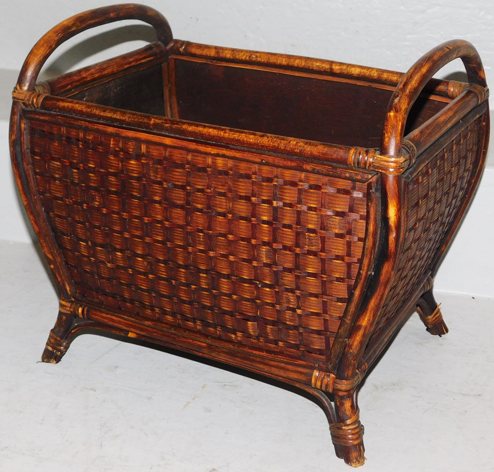 Rattan Two Handled Jardiniere with Splay Feet: Rattan Two Handled Jardiniere with Splay Feet . 12 1/4" H 14 1/4" W 10" D "ALL DESCRIPTIONS AND ANY CONDITION STATEMENT GIVEN BY LANGSTON AUCTION GALLERY ARE STRICTLY OPINIONS AND LANGSTON'S SHALL