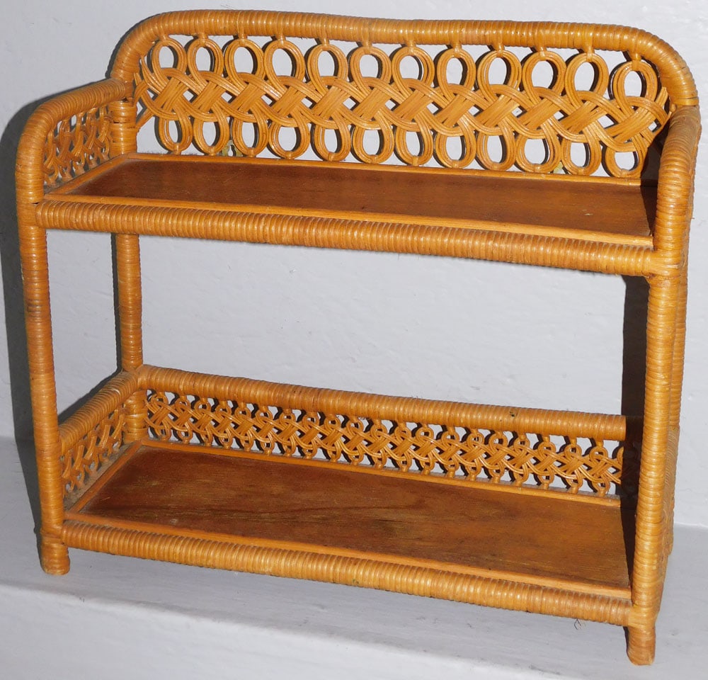 Vintage Natural Wicker Two Tier Wall Shelf: Vintage Natural Wicker Two Tier Wall Shelf. 16" H 17 1/2" W 6 1/2" D "ALL DESCRIPTIONS AND ANY CONDITION STATEMENT GIVEN BY LANGSTON AUCTION GALLERY ARE STRICTLY OPINIONS AND LANGSTON'S SHALL HAVE NO