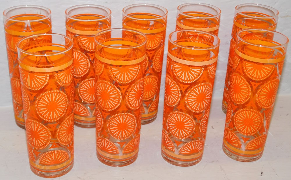 Nine Mid Century Retro Libbey Tom Collins Citrus Pattern Glasses: Nine Mid Century Retro Libbey Tom Collins Citrus Pattern Glasses. 6 3/4" H 2 1/2" Dia. "ALL DESCRIPTIONS AND ANY CONDITION STATEMENT GIVEN BY LANGSTON AUCTION GALLERY ARE STRICTLY OPINIONS AND