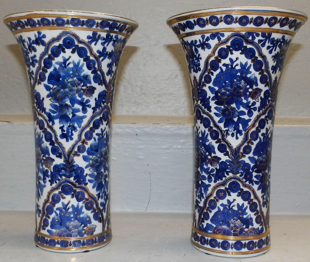 Pair of Blue & White Oriental Porcelain Vases: Pair of Blue & White Oriental Porcelain Vases . 11 3/4" H 7" Dia. "ALL DESCRIPTIONS AND ANY CONDITION STATEMENT GIVEN BY LANGSTON AUCTION GALLERY ARE STRICTLY OPINIONS AND LANGSTON'S SHALL HAVE NO