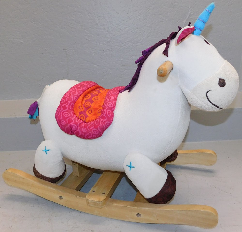 Maple & Upholstered Rocking Horse: Maple & Upholstered Rocking Horse . 18" H 13 1/2" W 23 3/4" D "ALL DESCRIPTIONS AND ANY CONDITION STATEMENT GIVEN BY LANGSTON AUCTION GALLERY ARE STRICTLY OPINIONS AND LANGSTON'S SHALL HAVE NO