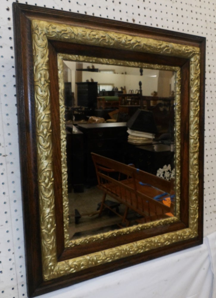 Antique Oak Framed Bevel Edge Mirror: Antique Oak Framed Bevel Edge Mirror . 29 1/2" x 25 1/2" "ALL DESCRIPTIONS AND ANY CONDITION STATEMENT GIVEN BY LANGSTON AUCTION GALLERY ARE STRICTLY OPINIONS AND LANGSTON'S SHALL HAVE NO