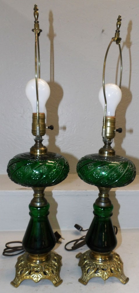 Pair of Emerald Green & Brass Oil Lamps Electrified: Pair of Emerald Green & Brass Oil Lamps Electrified . 26" H 6" Dia. "ALL DESCRIPTIONS AND ANY CONDITION STATEMENT GIVEN BY LANGSTON AUCTION GALLERY ARE STRICTLY OPINIONS AND LANGSTON'S SHALL HAVE NO