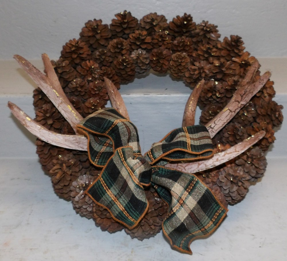 Decorative Pine Cone Wreath: Decorative Pine Cone Wreath . 18" Dia. "ALL DESCRIPTIONS AND ANY CONDITION STATEMENT GIVEN BY LANGSTON AUCTION GALLERY ARE STRICTLY OPINIONS AND LANGSTON'S SHALL HAVE NO RESPONSIBILITY FOR ERRORS OR