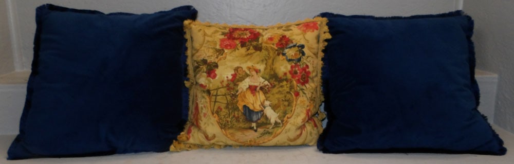 Three Decorative Pillows: Three Decorative Pillows . Up to 16 1/2" Dia. "ALL DESCRIPTIONS AND ANY CONDITION STATEMENT GIVEN BY LANGSTON AUCTION GALLERY ARE STRICTLY OPINIONS AND LANGSTON'S SHALL HAVE NO RESPONSIBILITY FOR