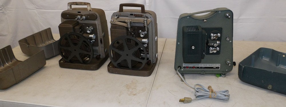 Two Vintage Projectors by Keystone & Bell & Howell: Two Vintage Projectors by Keystone & Bell & Howell . Case: 12" H 10" W 7 1/2" D "ALL DESCRIPTIONS AND ANY CONDITION STATEMENT GIVEN BY LANGSTON AUCTION GALLERY ARE STRICTLY OPINIONS AND LANGSTON'S
