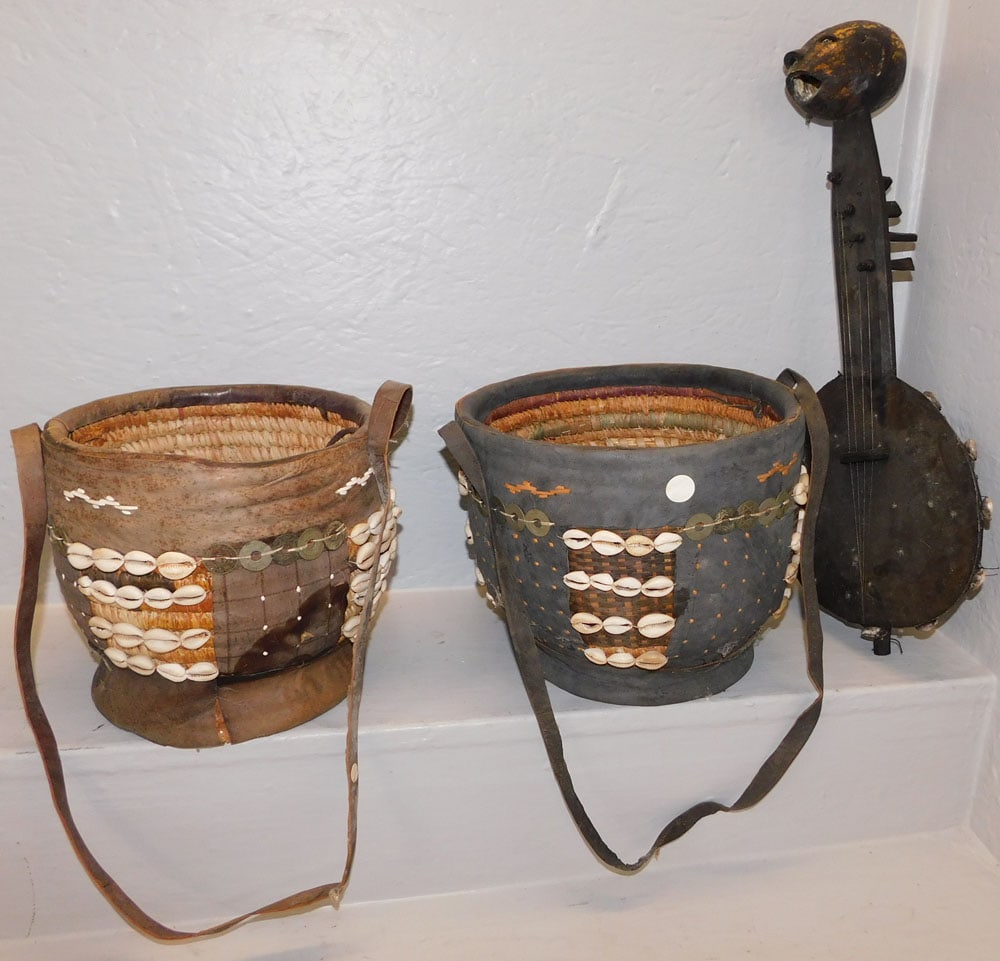 Two Rattan & Leather African Baskets & Musical Instrument: Two Rattan & Leather African Baskets & Musical Instrument. Up to 19 3/4" L "ALL DESCRIPTIONS AND ANY CONDITION STATEMENT GIVEN BY LANGSTON AUCTION GALLERY ARE STRICTLY OPINIONS AND LANGSTON'S SHALL